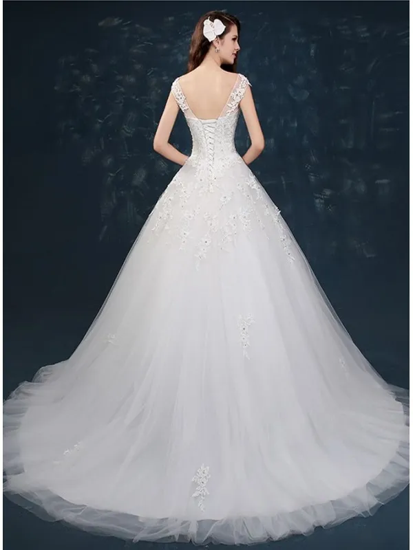 Abito da Sposa con collo velato effetto tattoo e gonna vaporosa