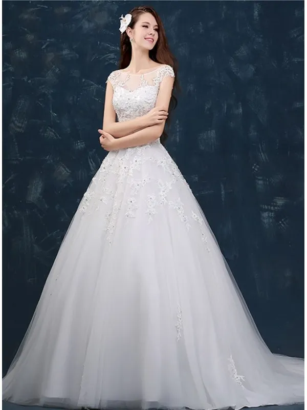 Abito da Sposa con collo velato effetto tattoo e gonna vaporosa