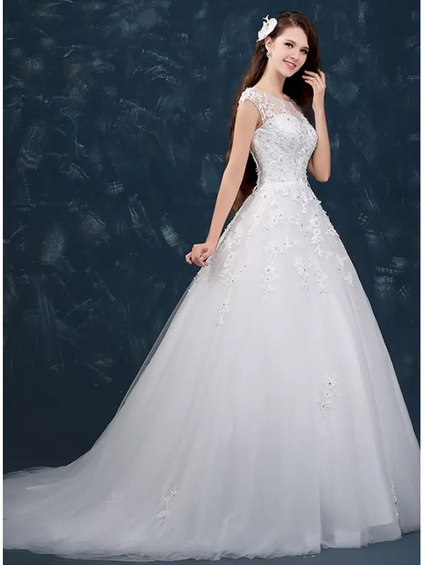 Abito da Sposa con collo velato effetto tattoo e gonna vaporosa
