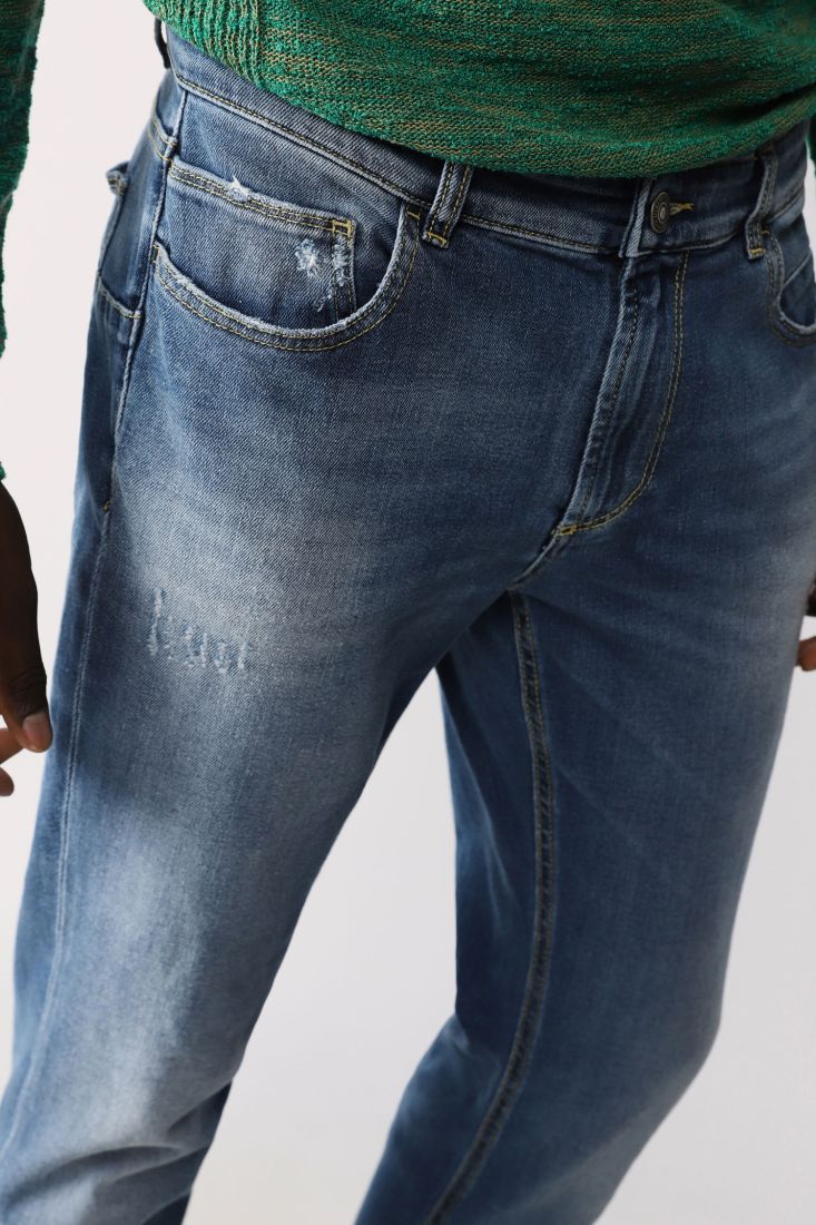Jeans skinny effetto délavé con cinque tasche
