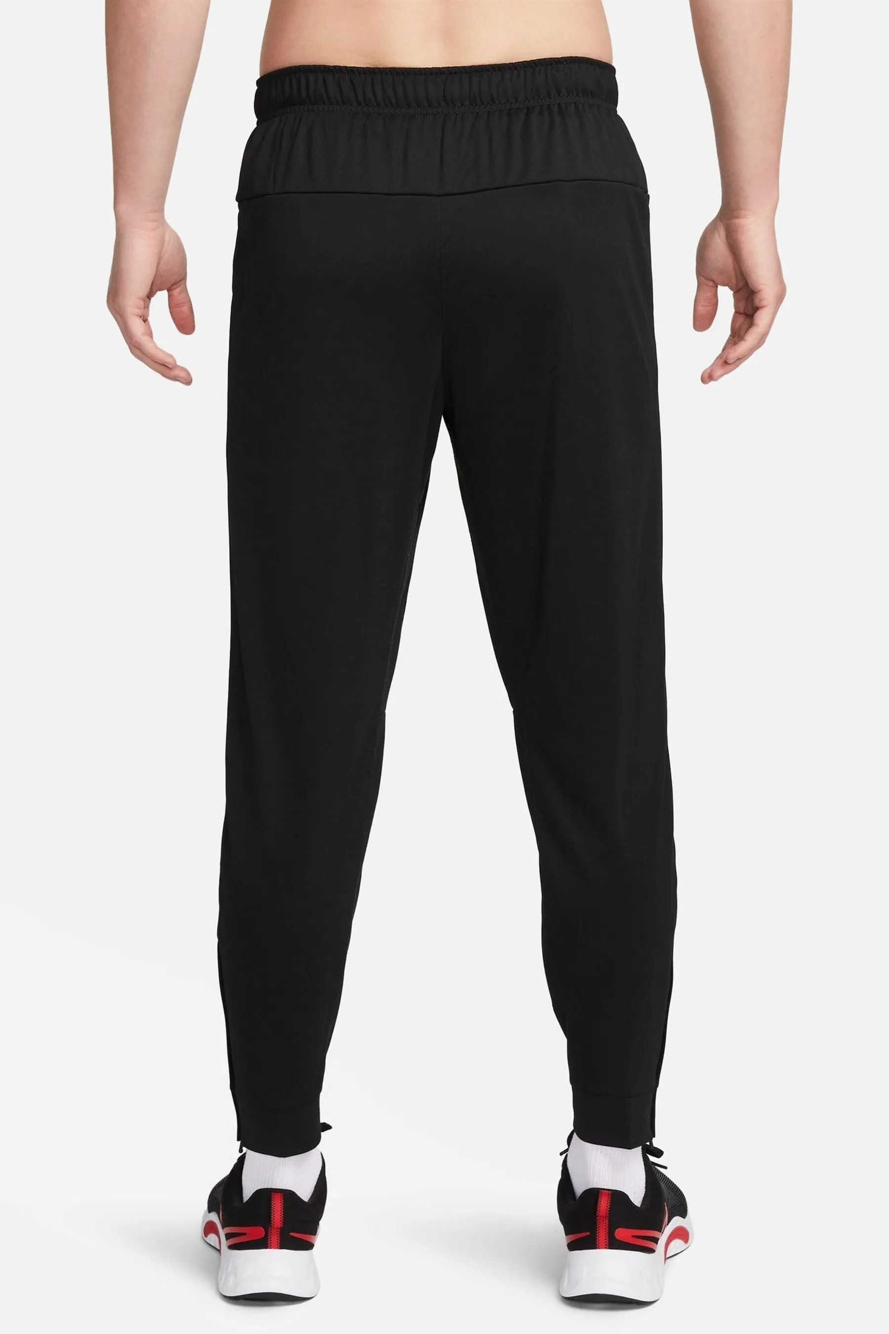 Nike - Pantaloni da jogging da allenamento Dri-FIT totale affusolata