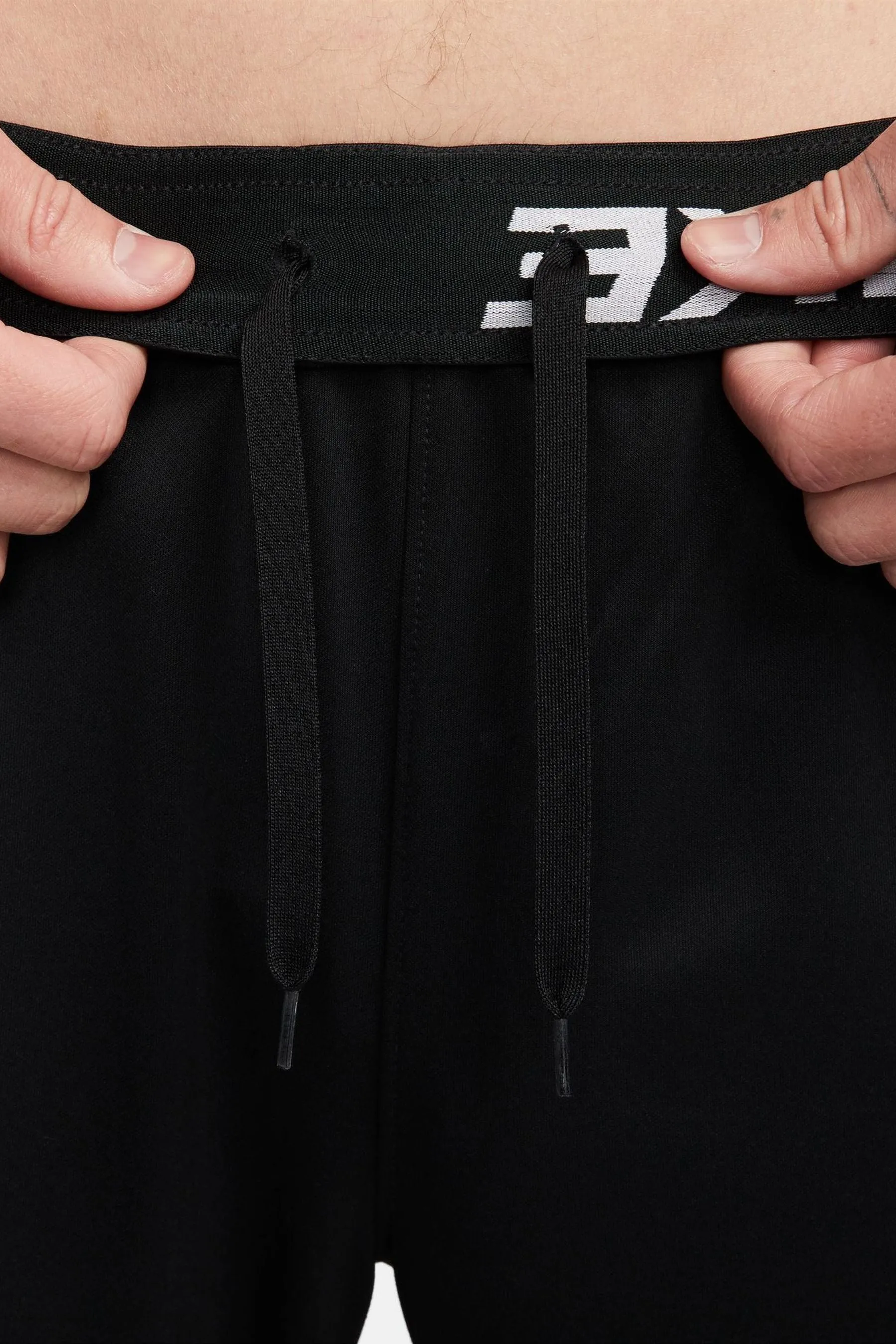 Nike - Pantaloni da jogging da allenamento Dri-FIT totale affusolata